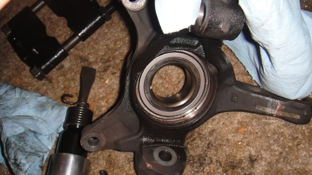 NEED REAL TIME HELP.....Outer bearing race stuck in knuckle housing